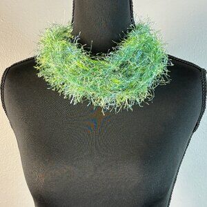 Green with blue hues fuzzy accessory
